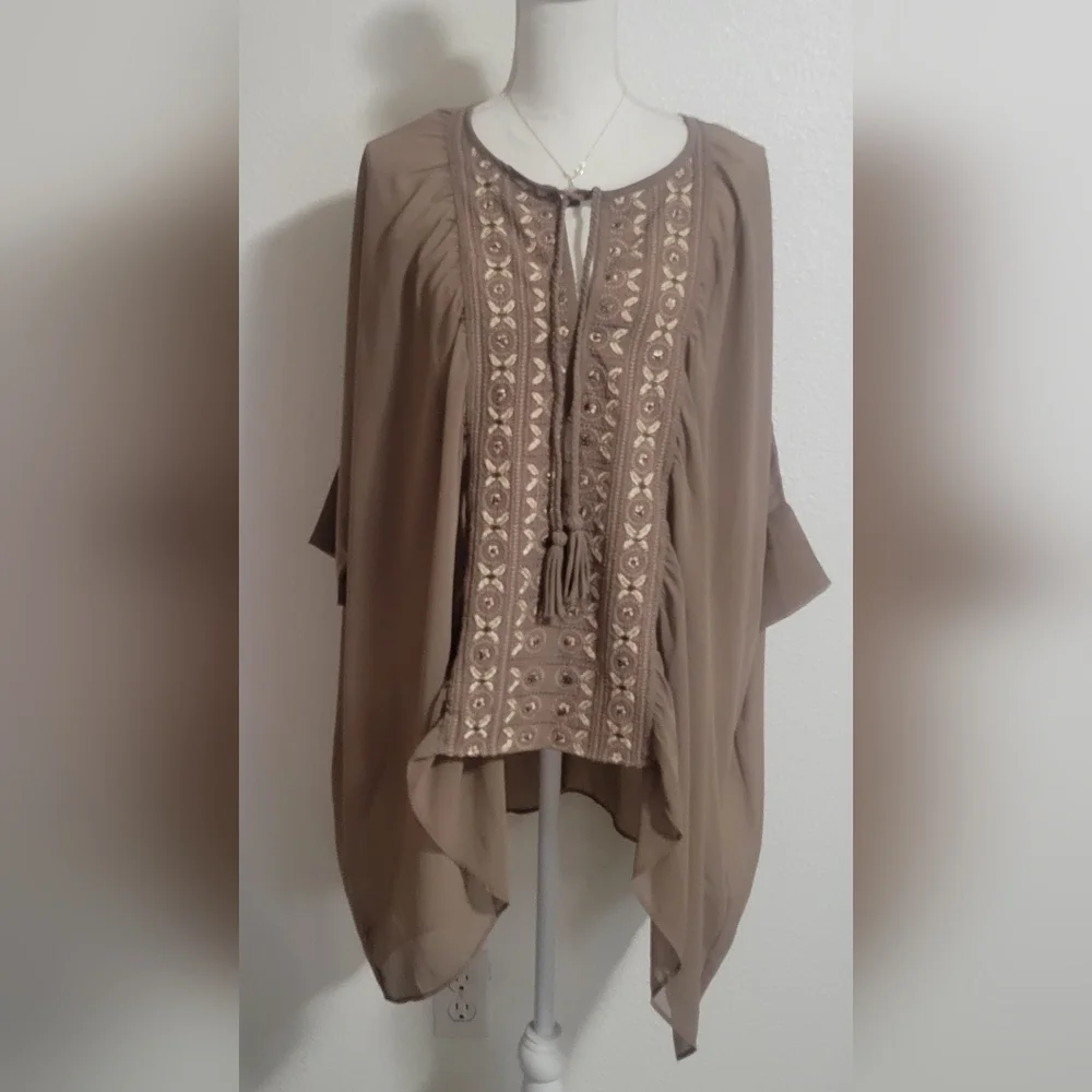 Free People embroidered oversized with tassel details boho style top size small